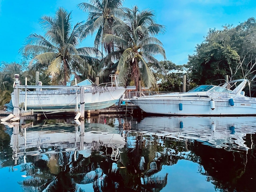 Boat cruising along Florida Intracoastal Waterway at golden hour
