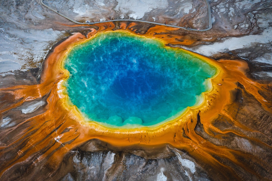 Grand Prismatic Spring in Yellowstone, steam rising in cool autumn air