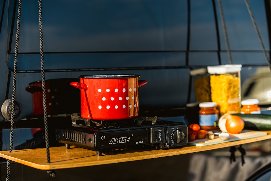 Campervan galley counter with stove and storage