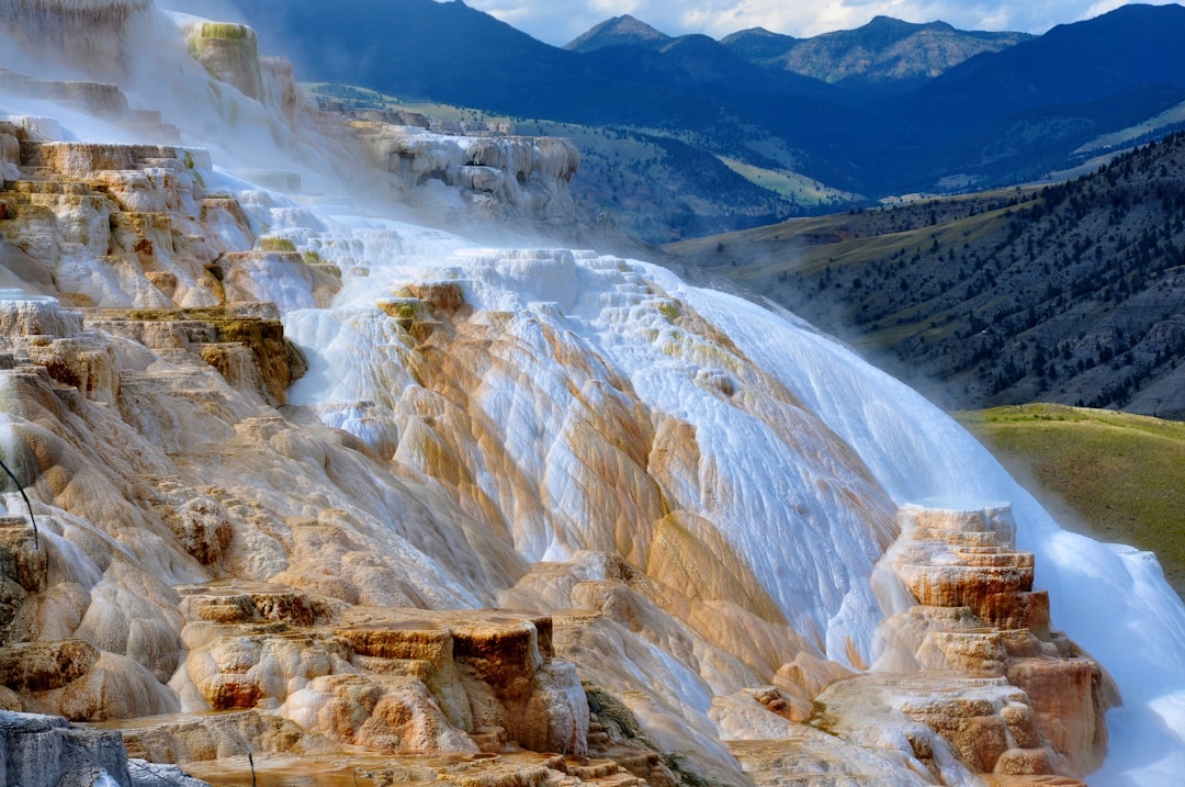 Steam rising from geysers in Yellowstone during cool autumn weather