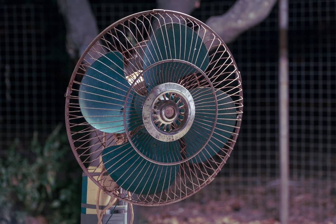Portable rechargeable fan inside a van