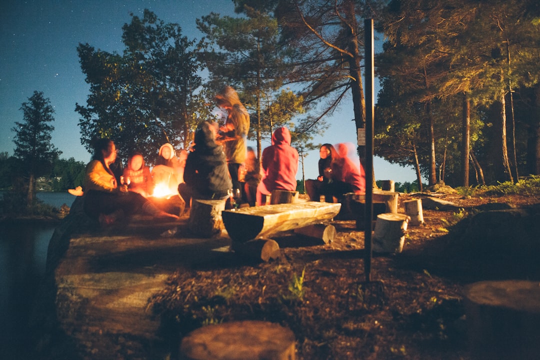 Campfire burning at a Blue Ridge autumn evening campsite