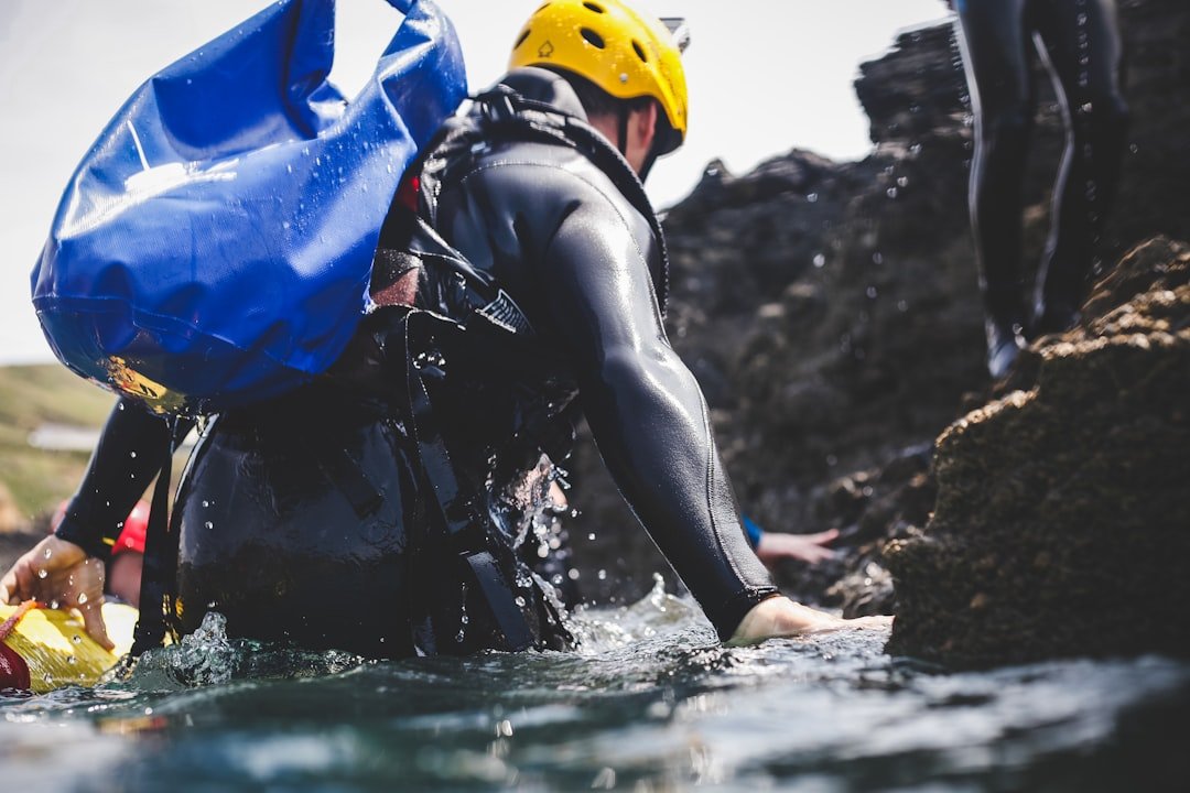 Dry bag with waterproof gear on a boat deck