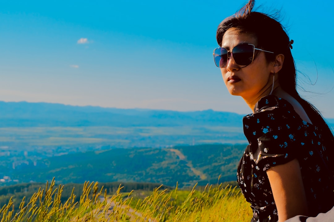Polarized sunglasses with a scenic mountain backdrop
