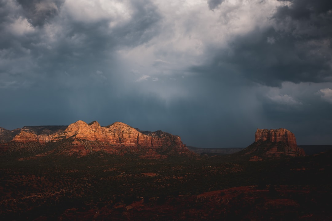 Storm clouds rolling over Sedona's red rock formations