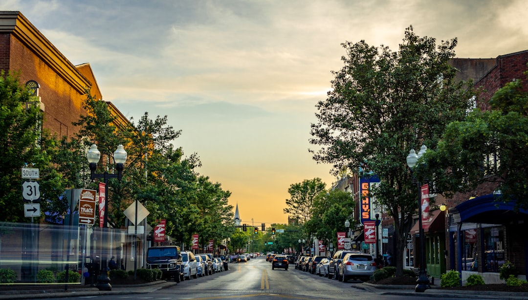 Charming coastal town main street with few tourists in late summer