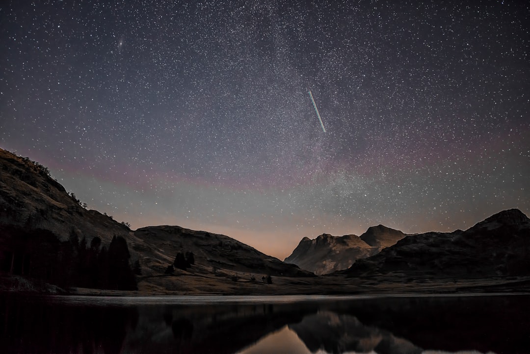 Perseid meteor shower streaking across a dark night sky