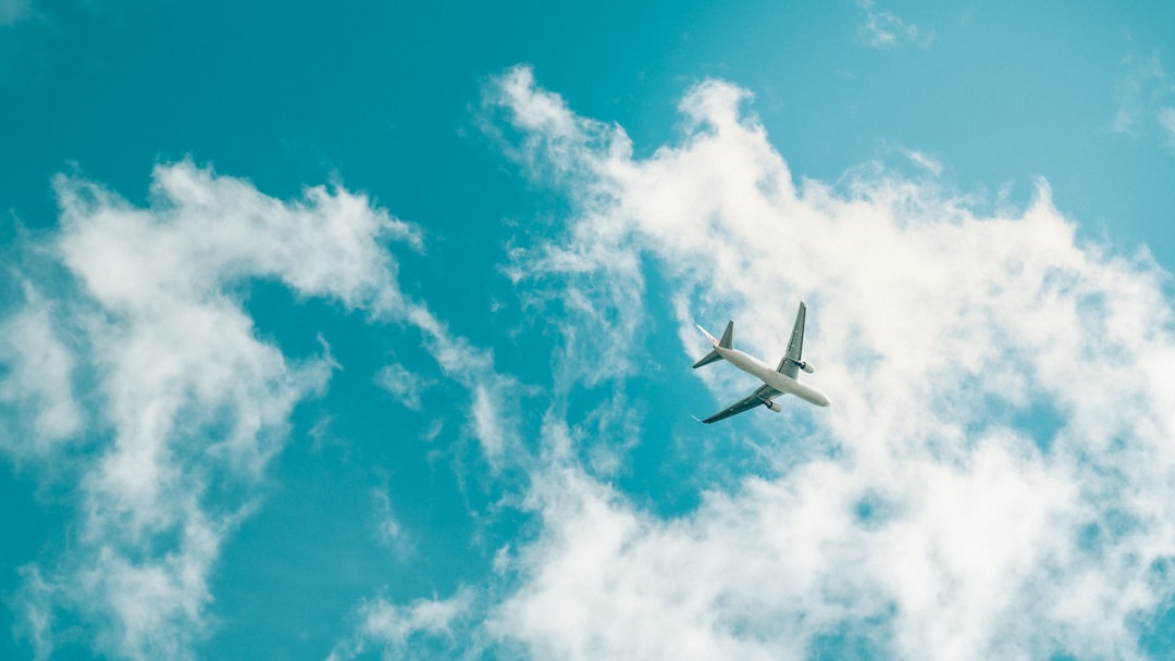 Airplane flying through a clear sky