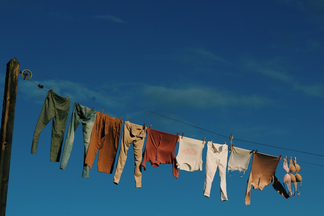 Wet clothing and travel gear hung up to dry