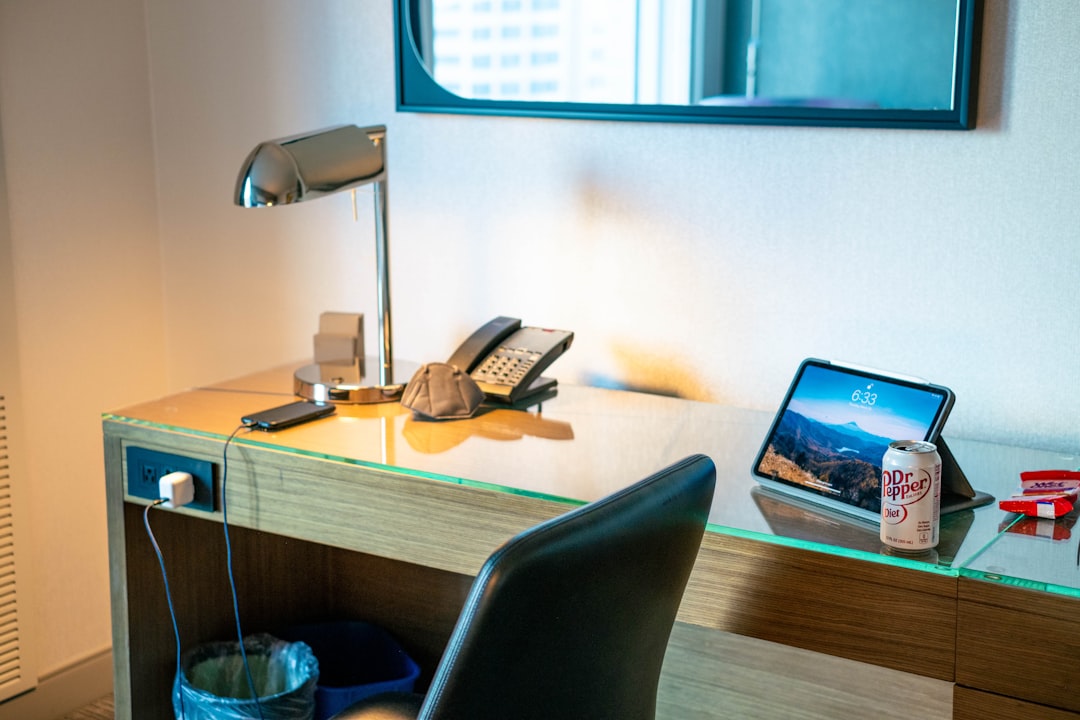 Hotel room desk with phone charging