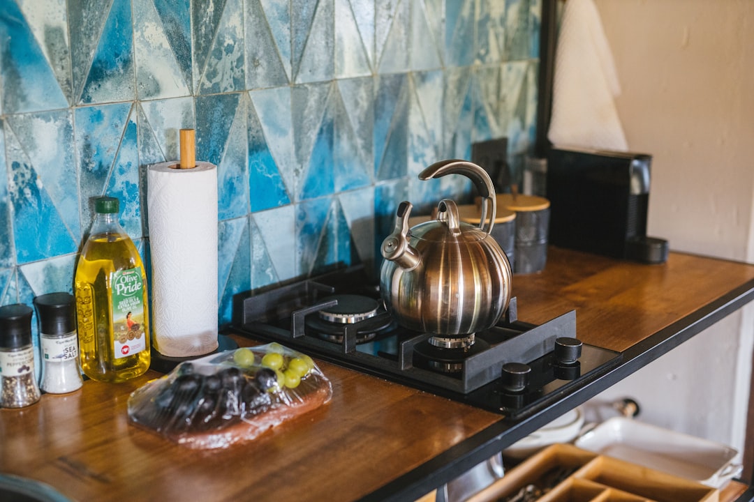 Campervan kitchen counter with blender and meal prep ingredients
