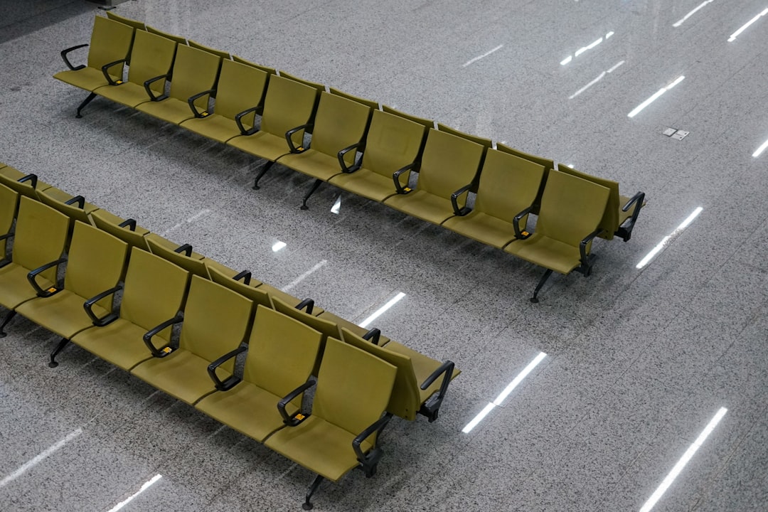 Empty seats in a quiet terminal before a red-eye departure