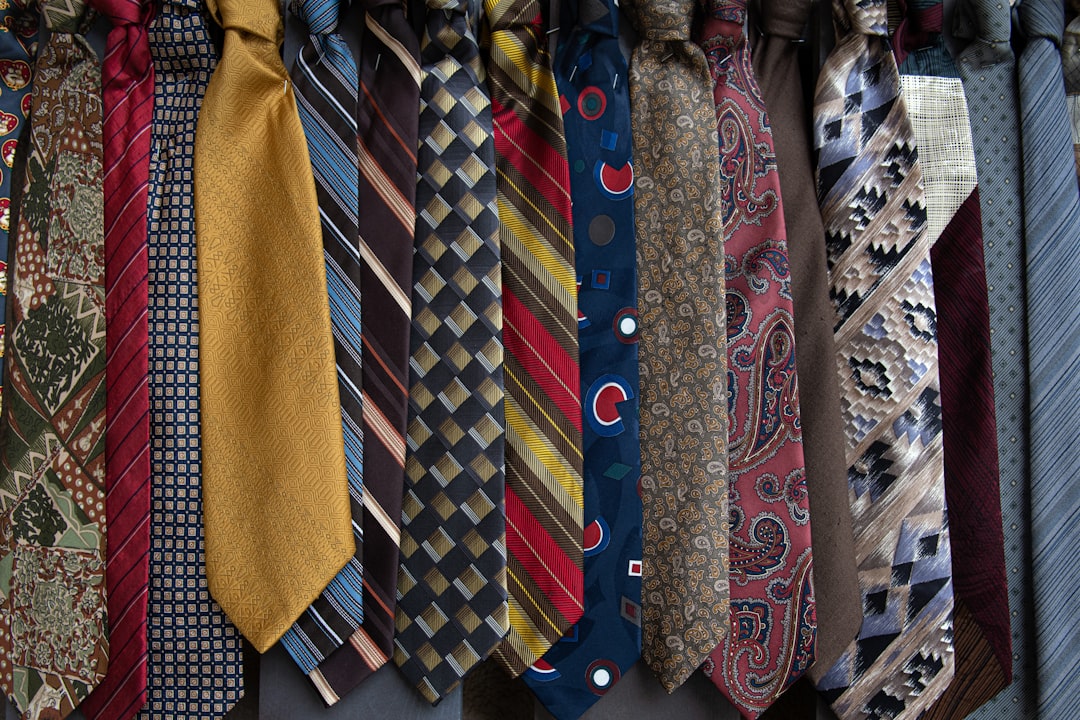Patterned neckties hanging ready for a formal event