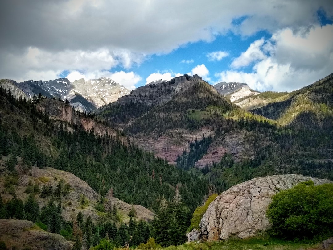 Ouray, Colorado nestled in a box canyon surrounded by vertical mountain walls