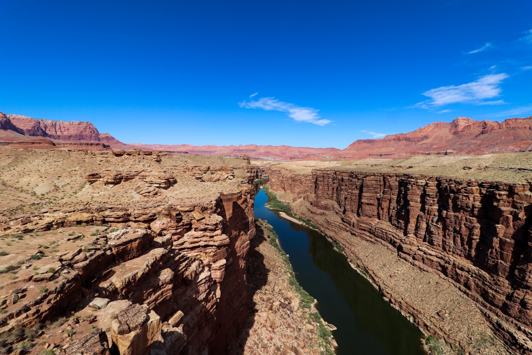 Deep river canyon cutting between mountain ridges