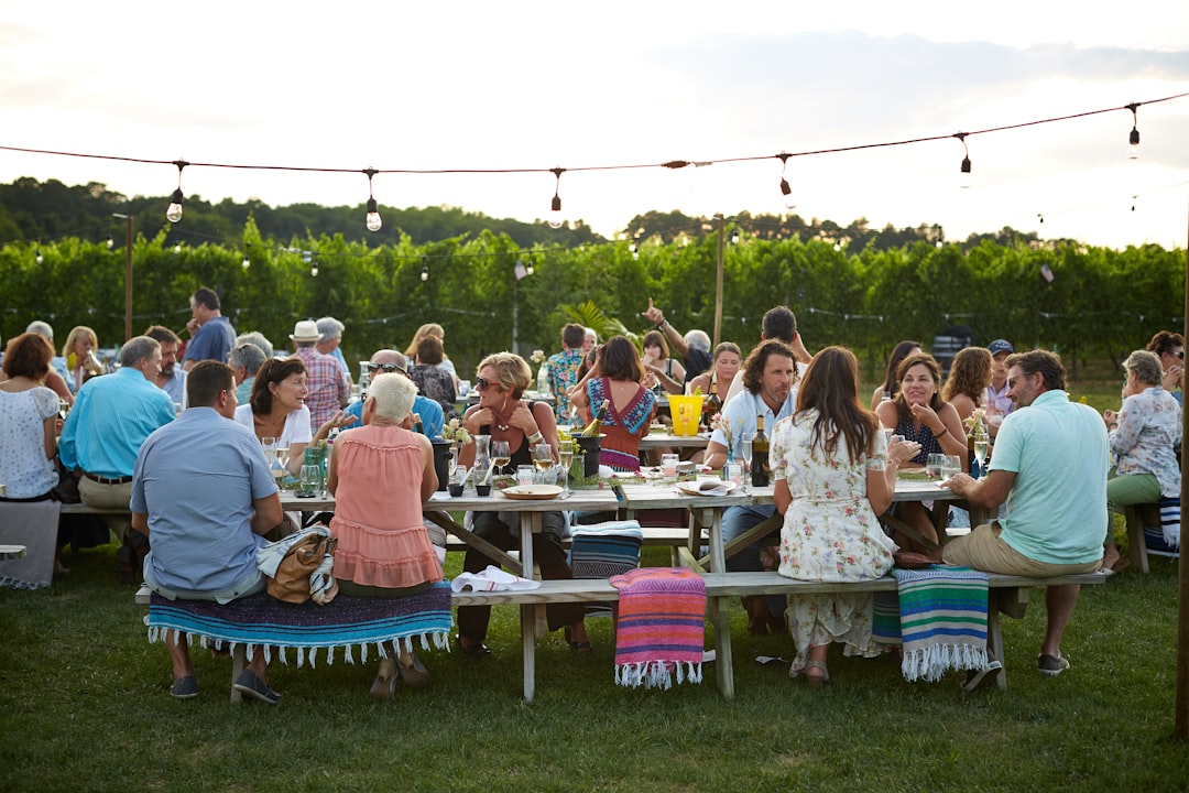 Outdoor wine picnic setup at a vineyard