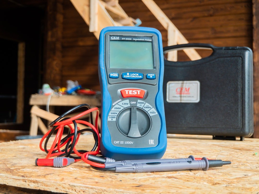 Multimeter testing automotive electrical connections