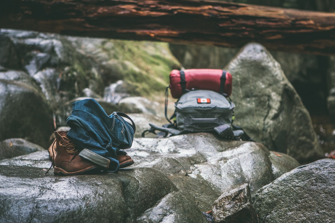 Hiking boots and daypack ready for a day on Pacific Northwest trails
