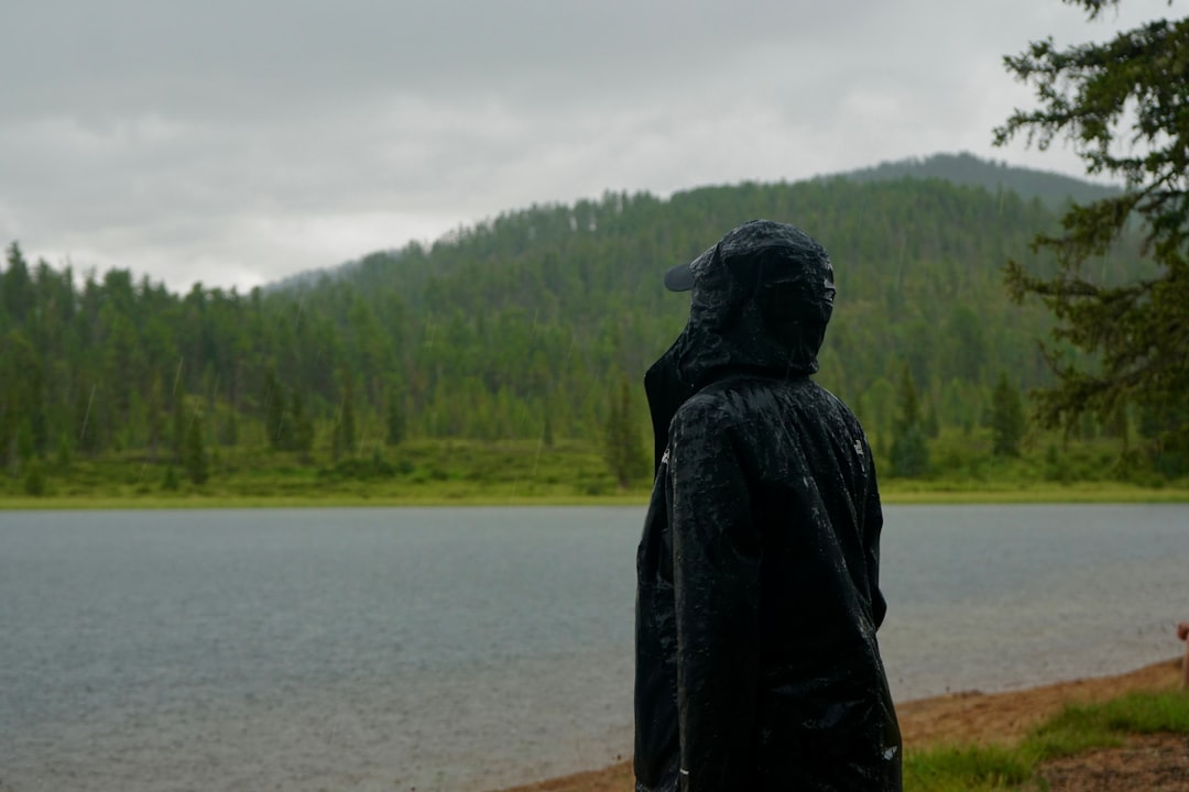Disposable rain poncho worn during outdoor hike