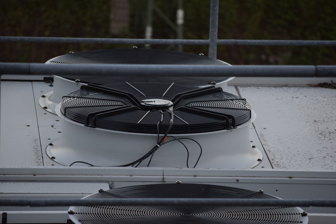 Roof vent fan installation in campervan ceiling