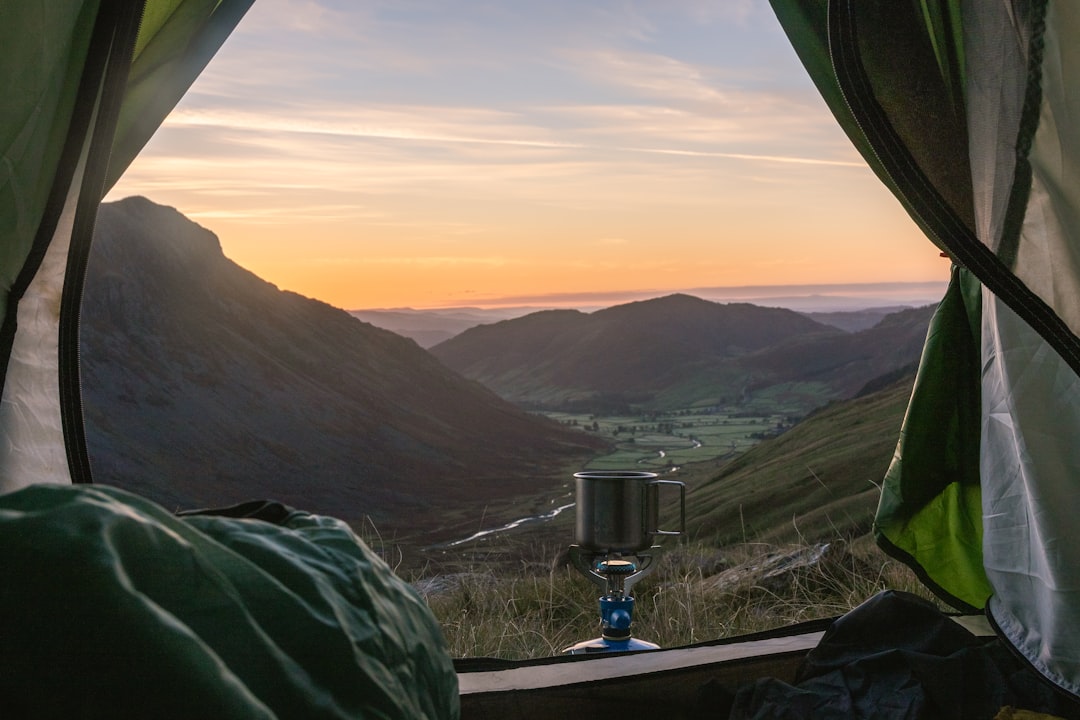 Morning at a mountain campsite with gear spread out