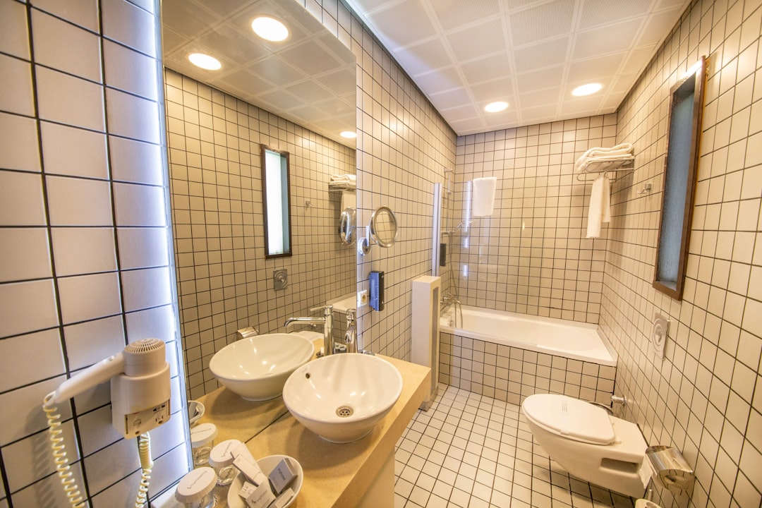 Hotel bathroom with mirror after a hot shower