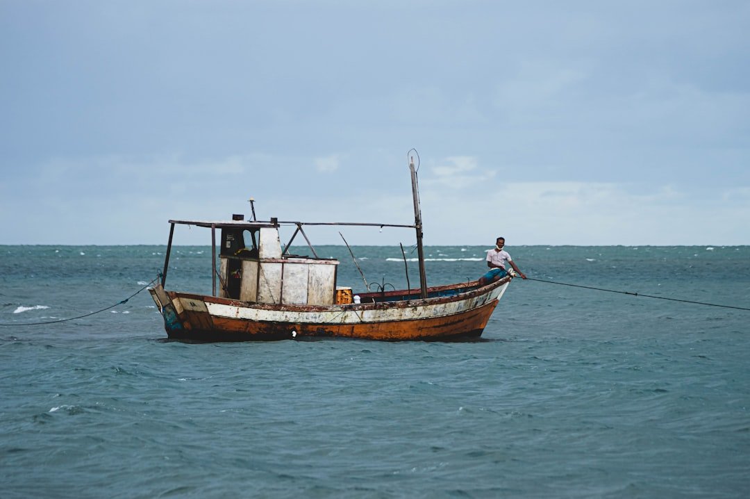 Fishing boat heading out on open water near Stuart, the Sailfish Capital of the World