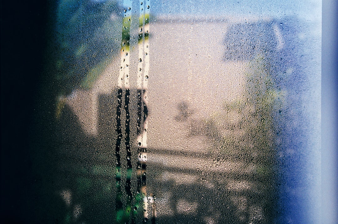 Morning condensation droplets covering a window