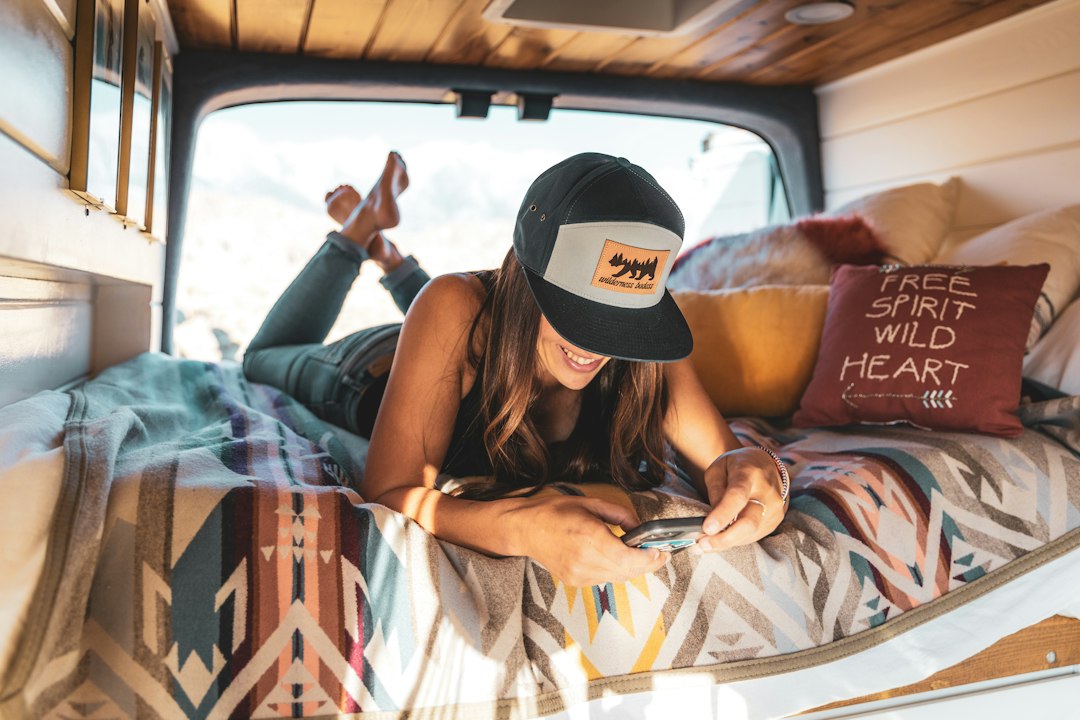 Relaxed morning inside a campervan with a cozy bed