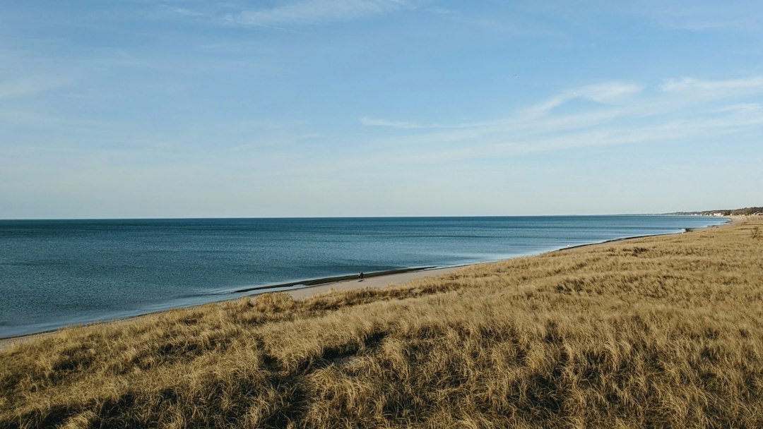 Open water on Lake Michigan stretching to the horizon from Milwaukee's south shore
