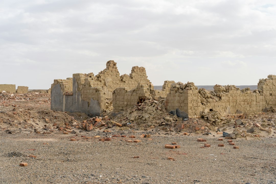 Weathered ruins of buildings in a desert ghost town