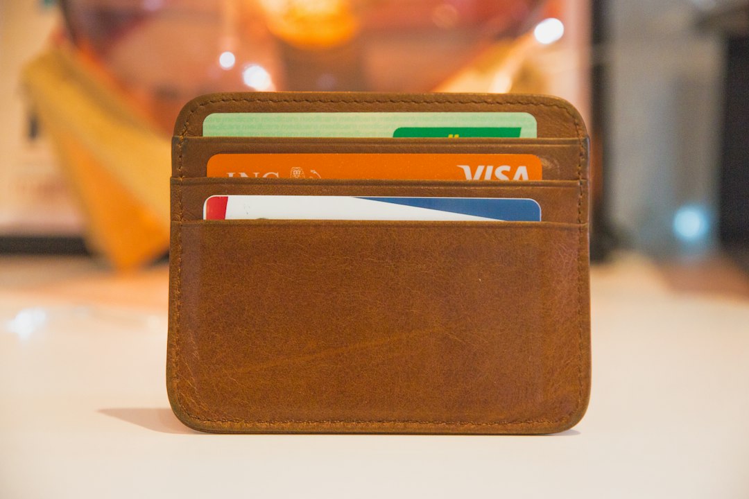 Slim leather wallet holding cards