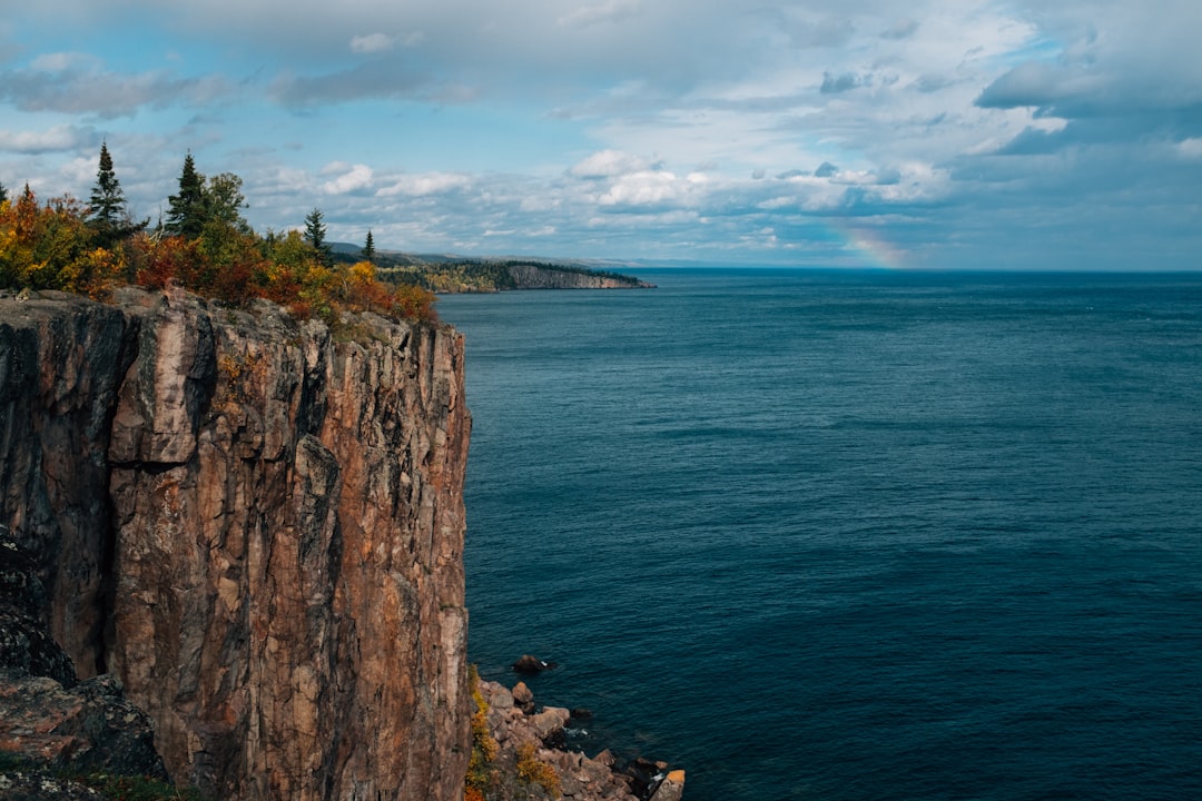 Lake Superior fall shoreline with colorful trees along the water