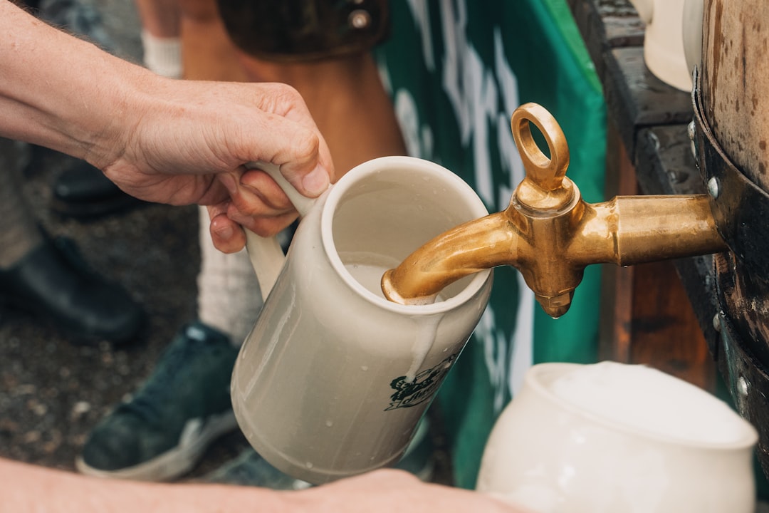 Beer steins raised in a toast at a festival