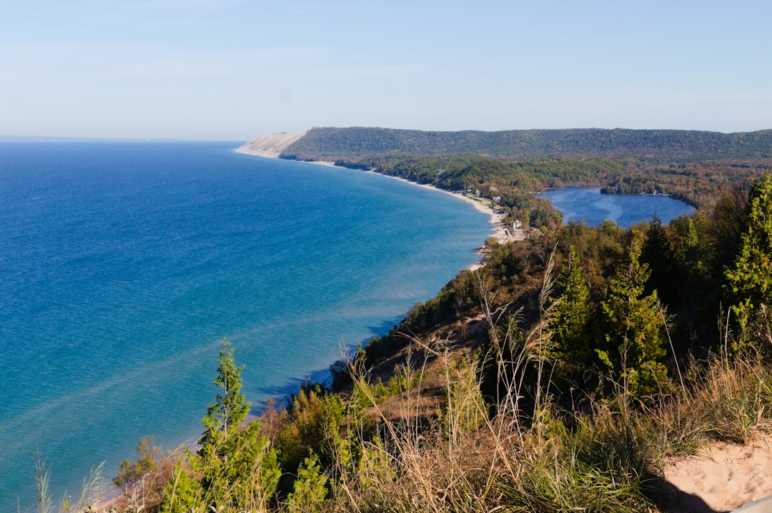 High bluff overlook above a vast lake shoreline