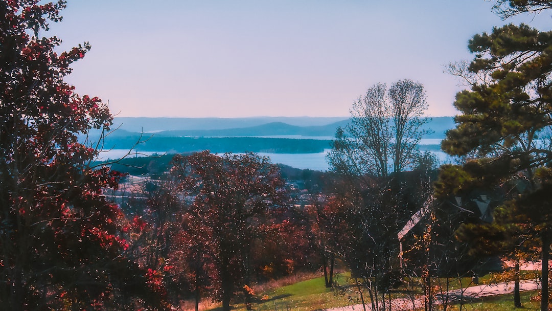 Autumn overlook of a misty river valley with colorful fall foliage