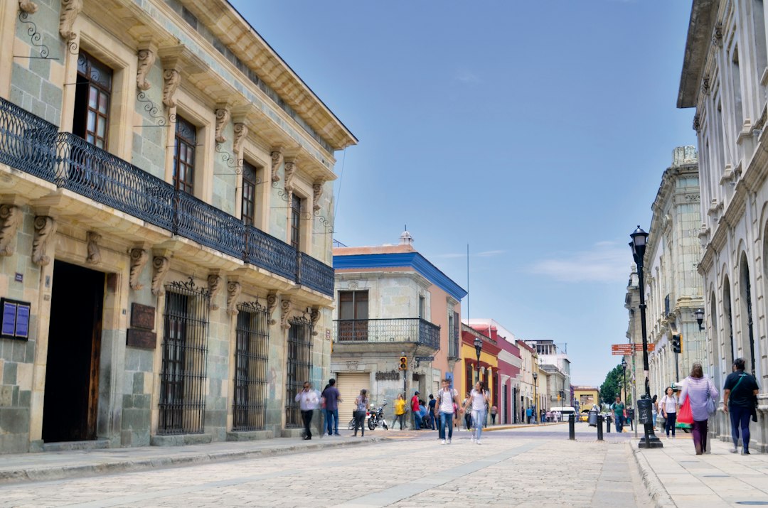 Cobblestone street with colonial architecture in Oaxaca, Mexico