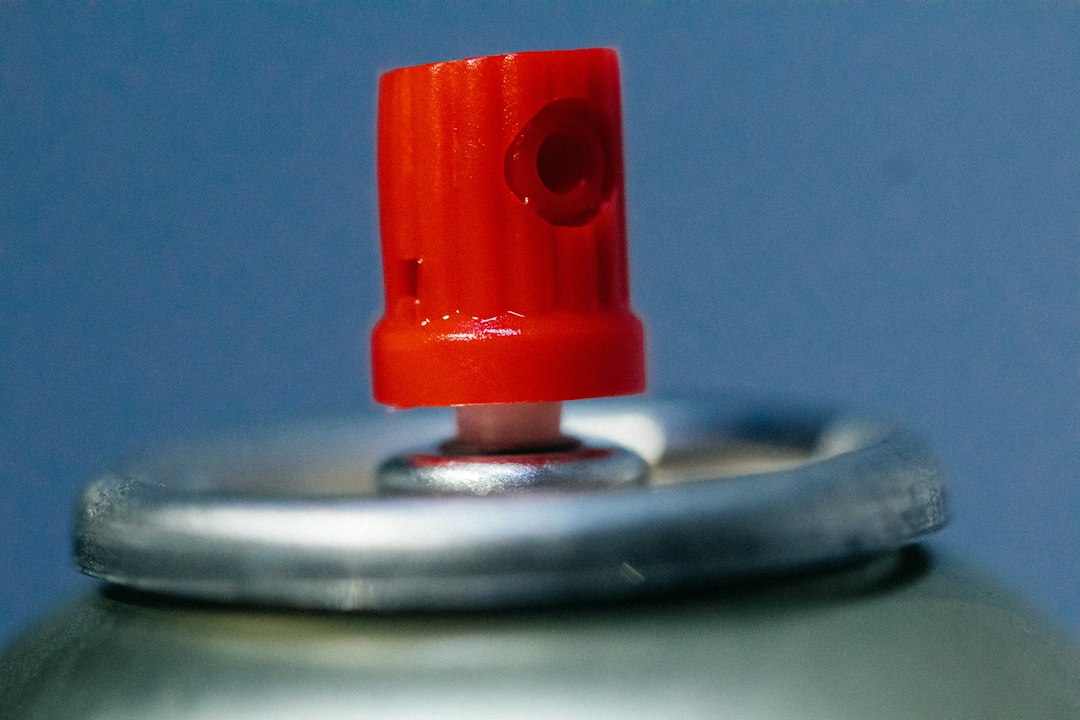 Close-up of an aerosol spray can nozzle
